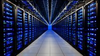 Modern server room corridor with rows of network equipment illuminated by blue LED lights, leading to vanishing point on clean white floor. Technology infrastructure.