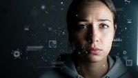 Young Caucasian businesswoman with digital interface overlay displaying data analytics and technology icons for futuristic business concepts.