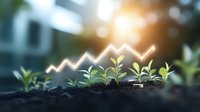 Growing green seedlings in soil with glowing chart line showing financial growth progress, business success concept on blurred background with sunlight.