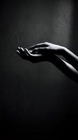 Graceful female hand with extended palm against dark background, conveying concepts of giving, receiving, help, support, spirituality, and human connection for editorial and wellness projects.