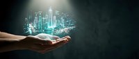 Businessman hand holding glowing digital city hologram with skyscrapers and buildings. Innovation and smart city technology concept for business growth and urban development.