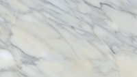 Elegant white marble surface with gray veining patterns creating luxurious natural stone texture for interior design and architectural applications.