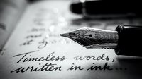 Fountain pen nib resting on handwritten calligraphy text with ink on paper, suitable for writing, literature, and creative content projects.