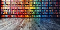 Rainbow colored bookshelf with multicolored book spines arranged in spectrum order on wooden floor, creating vibrant library interior background for education concepts.