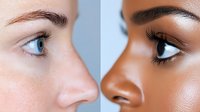 Side view close up of two contrasting female faces showing different skin tones, eye colors, and facial features in beauty and cosmetic concept.