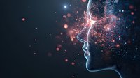 Glowing profile silhouette with sparkles and particles dissolving into starry space background, representing consciousness, mind and artificial intelligence concept.