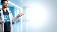 Professional male doctor in white coat presenting futuristic holographic medical interface technology in modern hospital corridor with copy space.