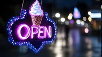 Glowing neon ice cream shop open sign with purple and blue lights against blurred night city background creates welcoming atmosphere for sweet treats and desserts.