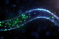 Glowing wave of blue and green particles flowing through dark space with sparkles and bokeh effects creating magical atmospheric background.