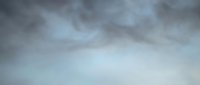 Dramatic gray storm clouds gathering in overcast sky creating moody atmospheric weather background for meteorology and climate concepts.