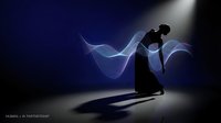 Silhouette of a man in business attire leaning forward with abstract blue wave energy flowing around him, representing innovation, partnership, and forward momentum in corporate environments.