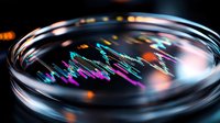 Colorful light reflections and refractions through curved glass create abstract patterns with purple and blue streaks against dark background. Macro photography.
