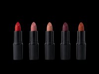 Five matte lipsticks in red, nude, mauve, plum, and brown shades, isolated on transparent background, ready for beauty clipart, stickers, and print on demand.