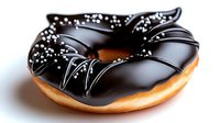 Dark chocolate glazed donut with white sprinkles and drizzle on golden-brown pastry, photographed in close-up against white background, showing rich texture and shine.