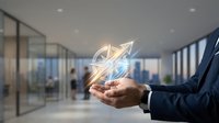 Businessman holding glowing growth arrows in cupped hands showing business success and financial progress in modern corporate office environment.