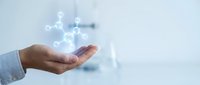 Businessman hand holding glowing molecular structure and connected nodes, representing innovation, technology, science, and digital transformation for corporate and research applications.