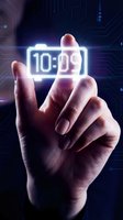 Hand touching glowing digital clock display showing 10:09 against circuit board background. Technology and time concept for apps, websites, and digital interfaces.