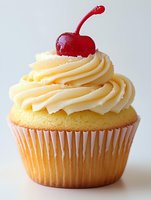 Vanilla cupcake with swirled buttercream frosting topped with maraschino cherry on white background for bakery menu dessert celebration party treats.