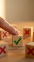 Hand placing wooden block with green checkmark among blocks with red X marks, symbolizing right choice, decision making, approval.
