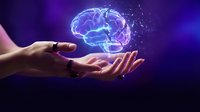 Hand holding glowing neon brain with neural connections on purple background. Concept for artificial intelligence, neuroscience, and innovation.