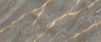 Elegant gray marble surface with golden veins creating luxurious natural stone texture for interior design and architectural applications.