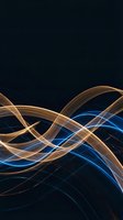 Abstract flowing light waves in blue and orange colors creating dynamic energy patterns on dark background for modern digital design projects.