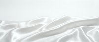 Smooth white silk fabric with flowing waves and soft folds, isolated on white background, ready for design projects, textiles, and product mockups.
