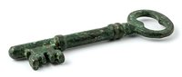 Ancient bronze key with green patina isolated on white background, suitable for historical design, educational materials, and vintage-themed projects.