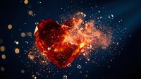 Exploding red crystal heart with fiery particles and sparks on dark blue background. Romantic love concept for Valentine's Day greeting cards and designs.