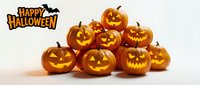 Group of carved jack-o-lantern pumpkins with glowing faces and Happy Halloween text on white background, isolated for seasonal decorations and holiday designs.