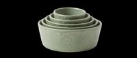 Stacked ceramic nesting bowls in sage green, isolated on transparent background. Ready for t-shirt design, clipart, print-on-demand, sublimation, and sticker applications.