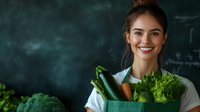 Young Hispanic woman holding fresh organic vegetables and greens in reusable eco bag against dark background, promoting healthy lifestyle and sustainability.