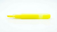 Yellow highlighter marker with transparent cap on white background, isolated and ready for design use on marketing materials, educational content, and office supply graphics.