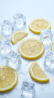 Fresh lemon slices and ice cubes scattered on a white wet surface, evoking a cool summer drink concept for food and beverage design.
