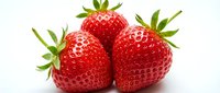 Fresh ripe strawberries with green leaves isolated on white background, suitable for food and beverage marketing, healthy eating content, and culinary designs.
