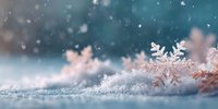 Delicate snowflakes rest on sparkling snow surface with soft bokeh lights and falling snow creating magical winter atmosphere for holiday designs.