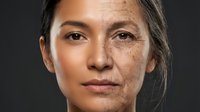 Mature woman face showing aging process with wrinkles and smooth skin comparison for skincare and anti-aging treatment concepts.
