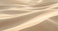 Smooth golden sand dunes with flowing curves and soft shadows creating natural desert landscape patterns for backgrounds and nature concepts.