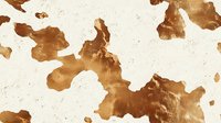 Abstract golden brown watercolor stains and splatters on textured paper background creating organic fluid shapes for artistic design projects.