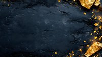 Dark moody black stone or slate background with scattered gold leaf flakes and decorative elements along edges, creating luxurious contrast for food or product photography.