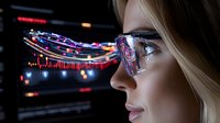 Young Caucasian businesswoman in glasses analyzing financial market data on digital screen with glowing charts and graphs in dark office environment.