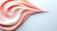 Smooth coral pink cream swirl with flowing curves on white background for cosmetic skincare beauty product design and luxury branding applications.