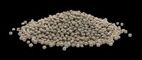 Pile of gray granular fertilizer pellets isolated on transparent background, ready for agriculture, gardening, and print on demand design use.