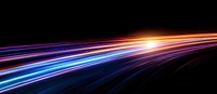 Dynamic light trails streak across dark background in vibrant neon colors of blue, purple, and orange, creating futuristic motion effect with bright energy burst.
