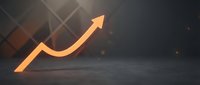 Glowing orange upward arrow on dark industrial background symbolizing business growth, success, and financial progress in corporate environment.