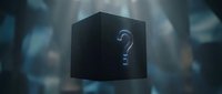 Black cube with glowing blue question mark floating in mysterious dark environment with soft lighting effects for concept designs and presentations.