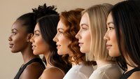 Diverse group of five women in profile showing different ethnicities and hair types representing beauty inclusivity and multicultural unity.