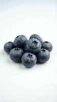 Fresh blueberries isolated on white background, ready for food and nutrition design projects, healthy eating concepts, and culinary applications.