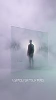 Silhouetted figure standing before glowing portal displaying misty figures, representing mental space, introspection, and consciousness exploration for wellness and mindfulness concepts.