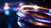 Glowing spiral light trails with orange and blue streaks against dark background create dynamic motion effect with bokeh particles and sparkles. For tech backgrounds.